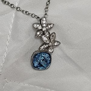Silver necklace with blue cubic zirconia